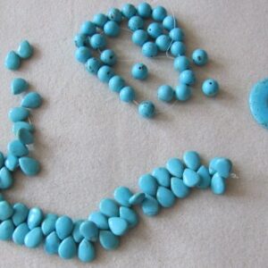 Stabilized Chalk Turquoise beads and donut - copyright Helen White 2011