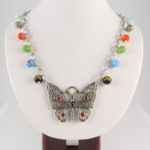 Necklace with butterfly pendant and millefiori beads - copyright Helen White