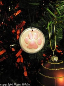 Paw tree decoration made with polymer clay.