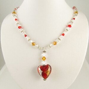Red heart necklace on bust