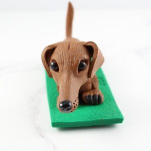 Brown dachshund sculpture