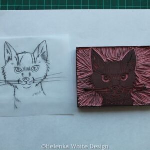 Cat face block and transfer paper.