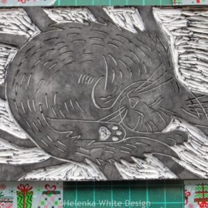 Curled up cat lino block