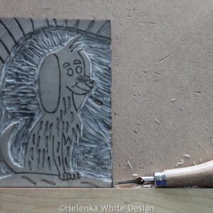 Final dog lino block with Abig cutting tool.