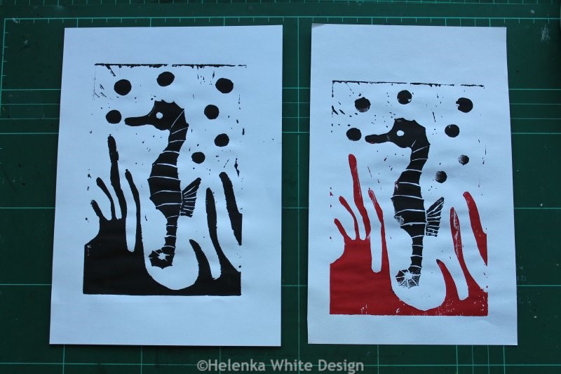 The making of my Seahorse lino print. 4 Seahorse test prints on cheap printer paper with water-based ink in black and in black and red.