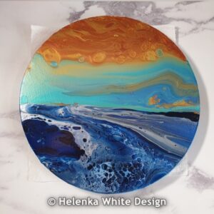 Seascape pour using flip cups on round canvas.
